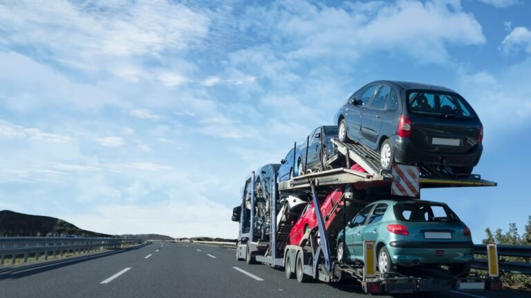 Vehicle shipping truck carrying cars on the interstate