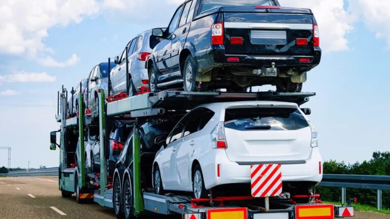 Auto transport truck hauling cars at average shipping cost